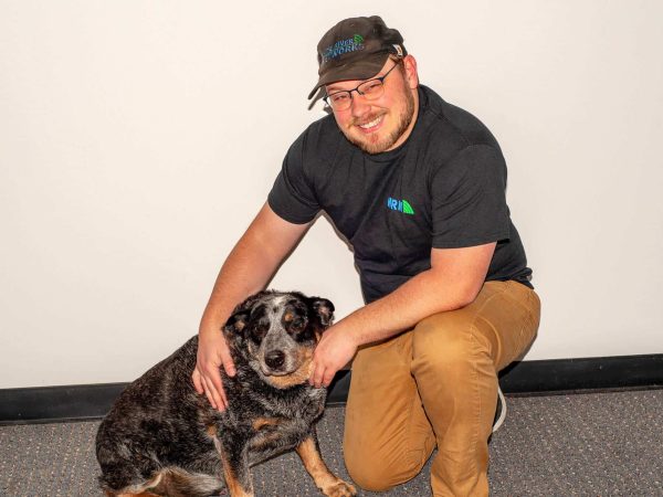 tech team with dog